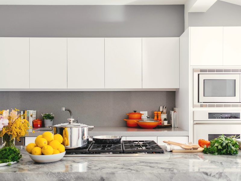 A clean, modern kitchen during preparation